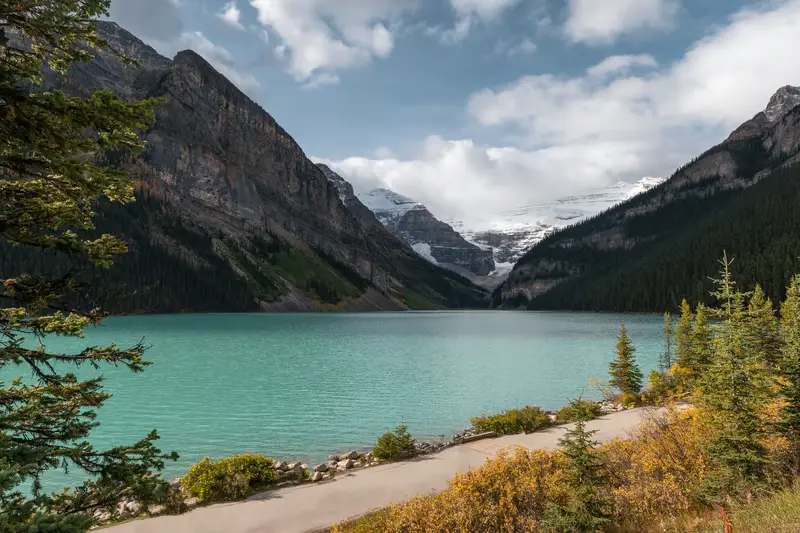 Scenic view of Lake Louise lakeshore trail on a day trip from Calgary to Banff National Park